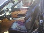 Leather reclining race seats.
