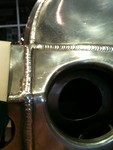 Ok this was a work of art. The fuel tank was part of the aluminum chassis. It simply must have been welded by an angel. This will only make sence to very few people, but as a fabricator this was truely a sight to see. Every weld was perfect, I scoured this thing for 20 minutes. From experiance it would take just one second of too much heat near an edge and BAM the entire chassis would be destroyed. Seriously outstanding.