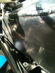 Ok this was a work of art. The fuel tank was part of the aluminum chassis. It simply must have been welded by an angel. This will only make sence to very few people, but as a fabricator this was truely a sight to see. Every weld was perfect, I scoured this thing for 20 minutes. From experiance it would take just one second of too much heat near an edge and BAM the entire chassis would be destroyed. Seriously outstanding.