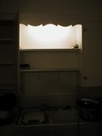 Leah is absolutely fascinated by this light and shelves over the sink. 