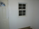Window looking out of pantry room onto the backyard.