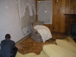 Me tearing up the carpet and padding in the livingroom. WEE DUST BUNNIES!