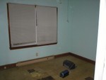 This is the future 3rd bedroom/pc room/guestroom. The walls we are planning on painting in this room a reddish/cranberry color I think.