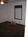 The 'LOVE' room err I mean the master bedroom. Looking from door to window facing side of the house.