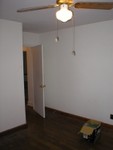 Master bedroom looking towards door into hallway.