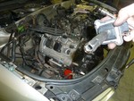 Oil on the ignition col due to leaking valve cover gasket.