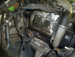 Bad oil leaks clearly visible by dirt sticking to oil