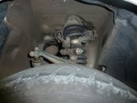 Passenger side upper control arms. You can see the damaged boots on the arms and the tire rod end, but the real concern is the rubber bushings on the inner ends of the arms. Close-ups are in the next few images.