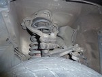 Zoomed out shot of th drivers side. You can see the torn boots here too.