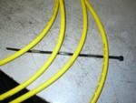 Slide all 3 hose pieces onto the zip tire.